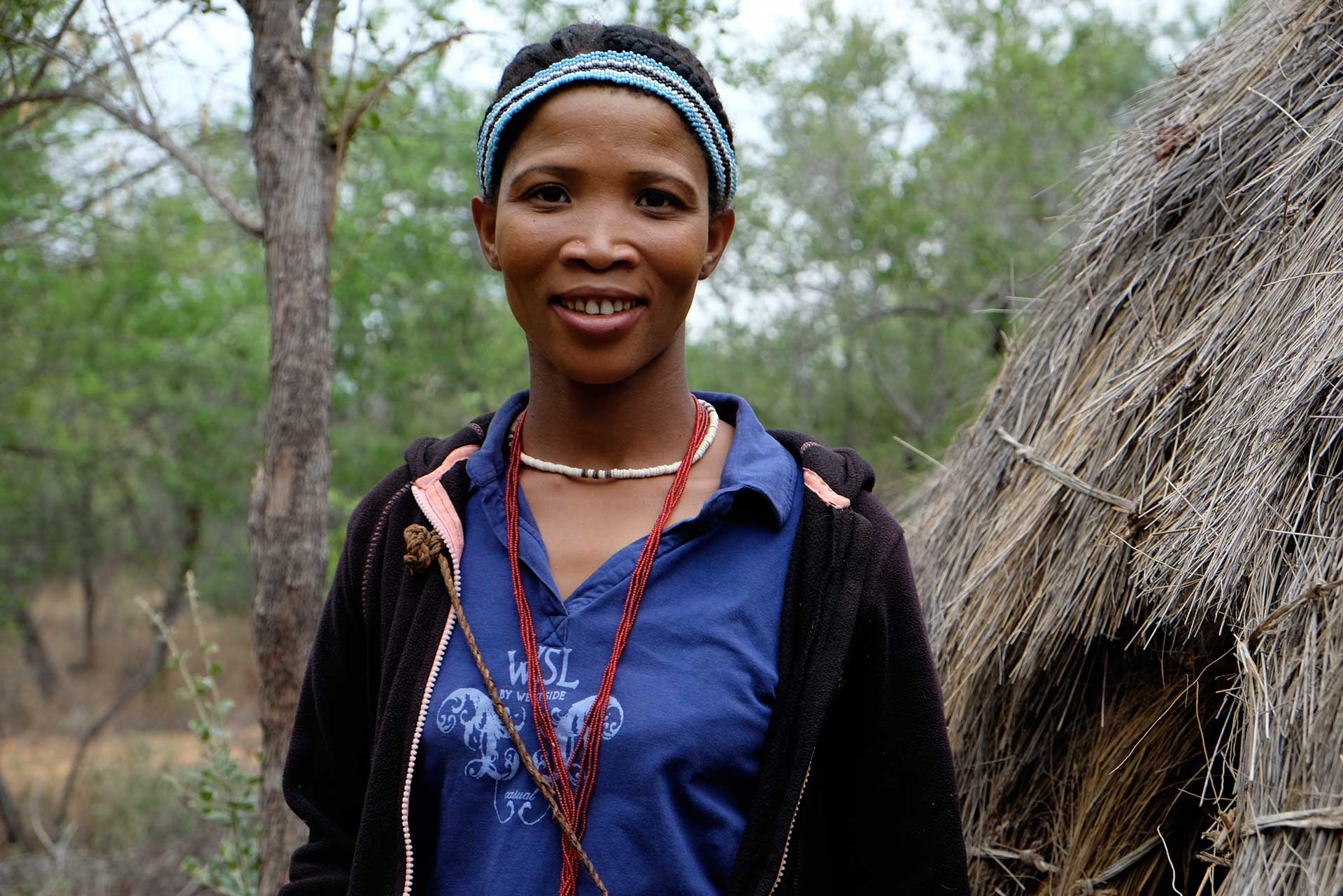 Young San Woman, Dqae Qare, Authentic Botswana Tours